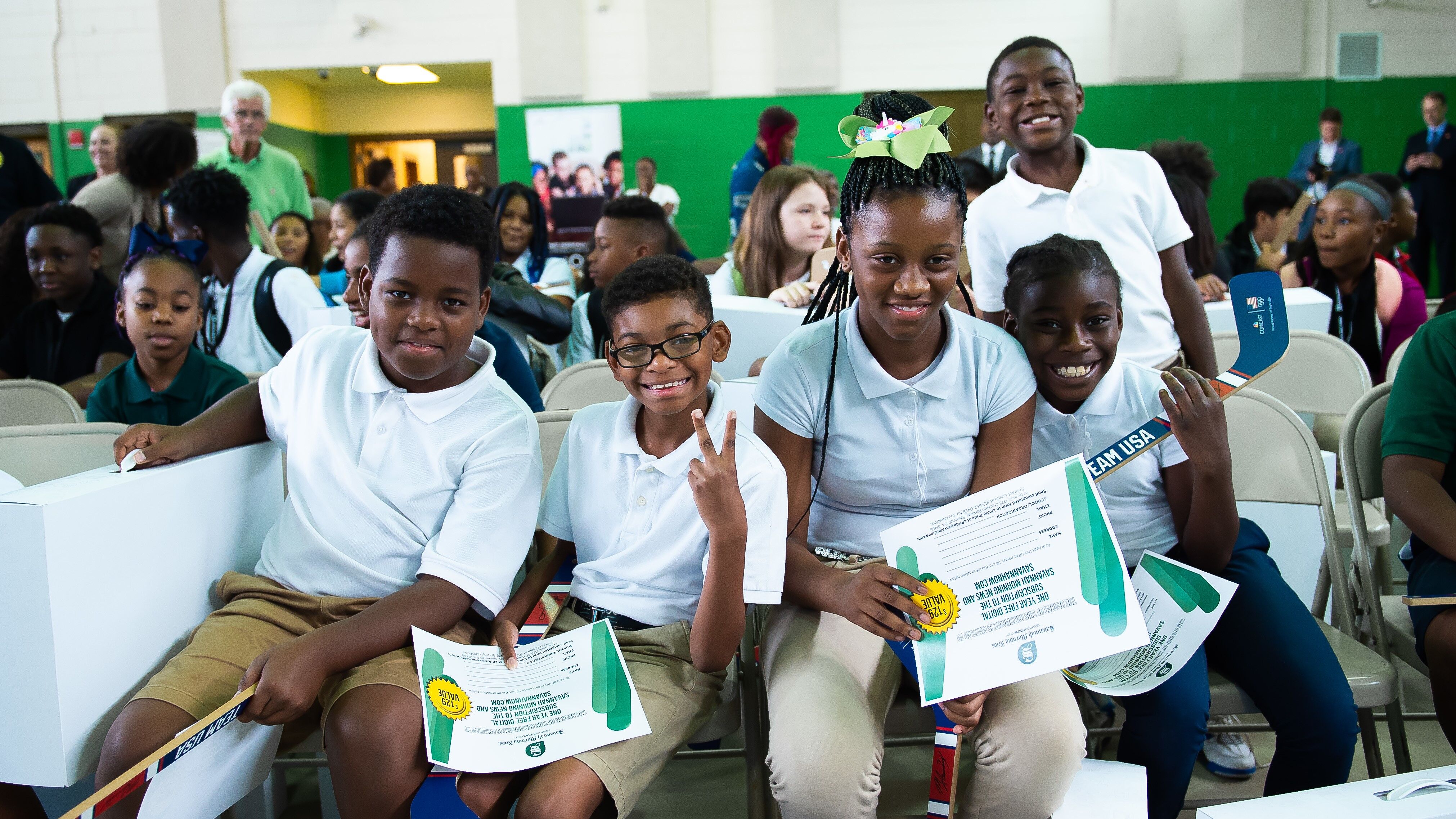 Students cheer at an Internet Essentials event.