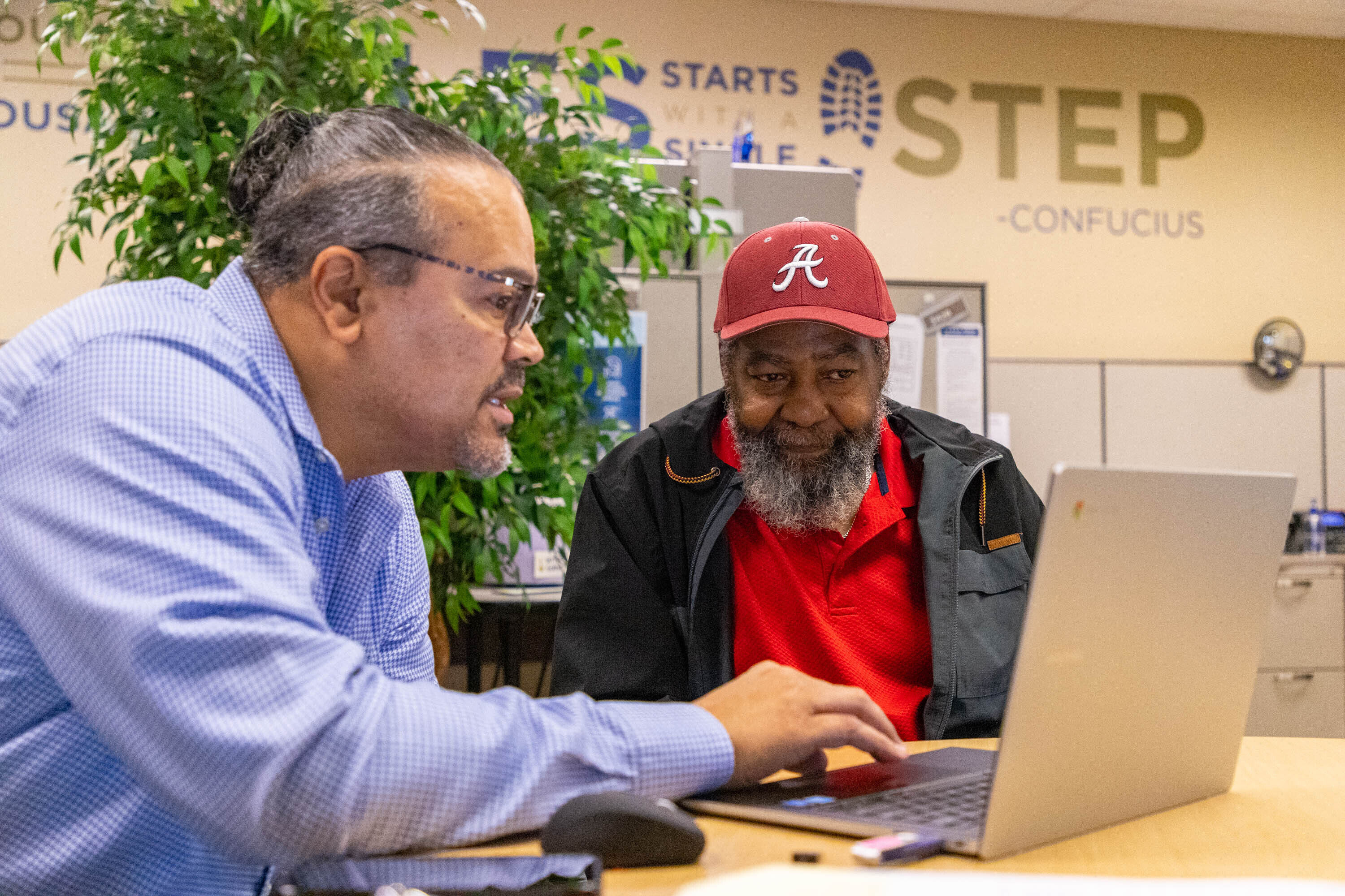 Goodwill of the Olympics & Rainier Region Digital Navigator helps a local senior develop digital skills.